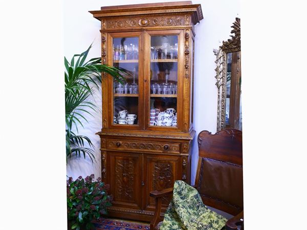A walnut grottesche cabinet