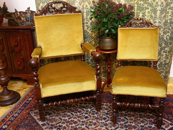 An oak armchair with a pair of chair set