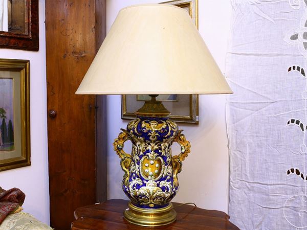 A glazed terracotta table lamp