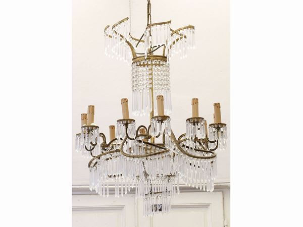 A BF gilded metal chandelier  - Auction Antiquities, Interior Decorations and Vintage  from the Panarello Gallery in Taormina - Maison Bibelot - Casa d'Aste Firenze - Milano