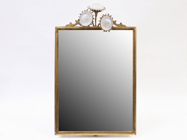 A gilded wall mirror