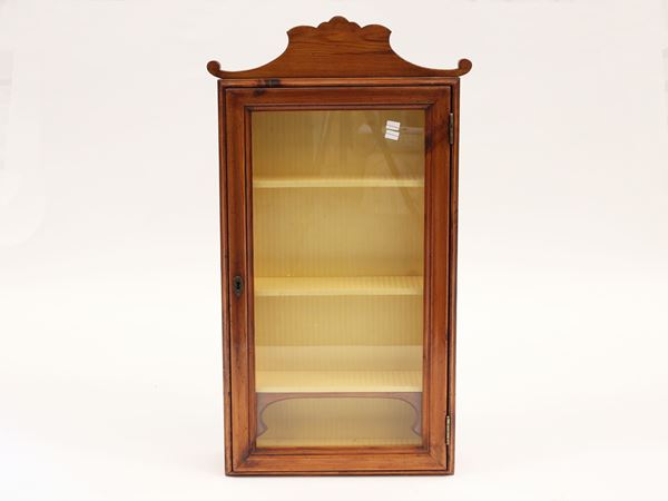 A wooden wall cabinet