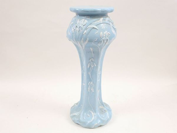 A blue glazed terracotta column