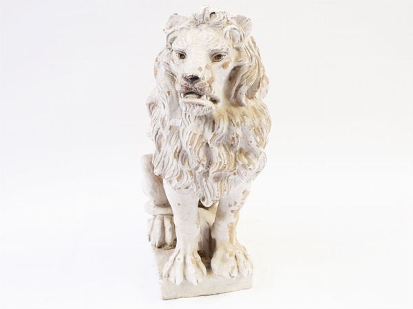A glazed terracotta lion figural group