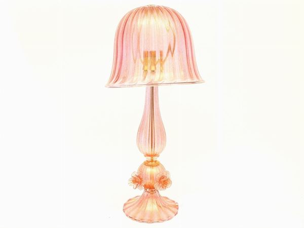 A pink blown glass table lamp