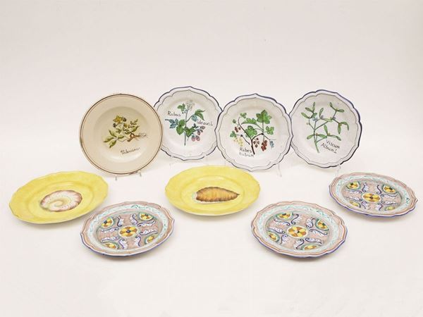 Nine ceramic plates