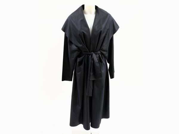 Two black silk and purple wool capes