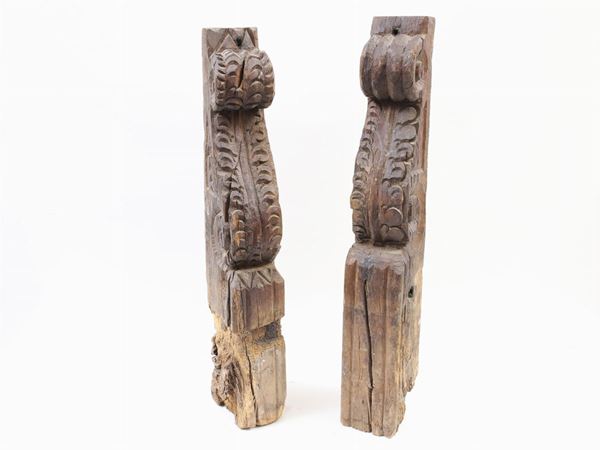 A pair of large fragments in wood