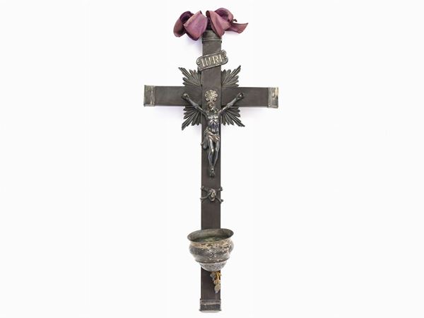 A wood and silver crucifix