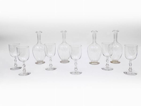 Serie di quattro bottiglie da vino in cristallo