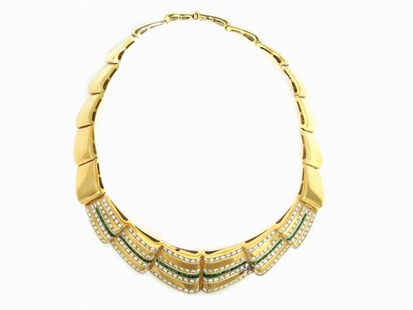 Yellow gold demi parure of animalier-shaped necklace and earrings with diamonds and emeralds