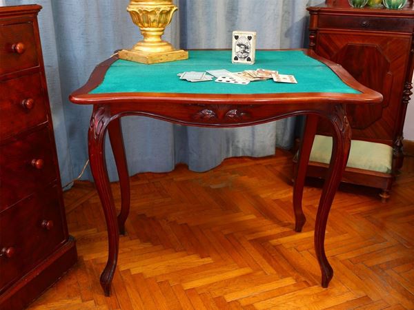 A mahogany game table