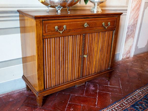 A small cherrywood sideboard