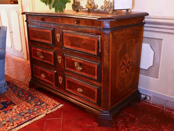 A walnut and cherrywood chest of drawer