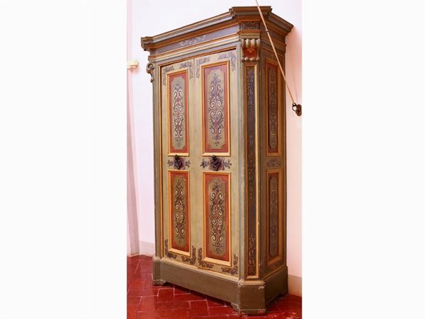 A lacquered wooden library cabinet