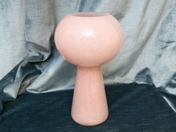 A small pink glass table lamp