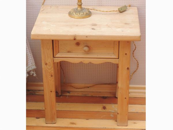 A pair of rustic softwood small table