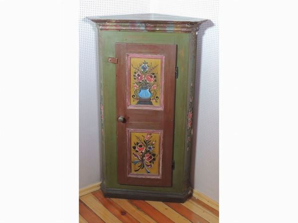 A small Tyrolean painted corner sideboard