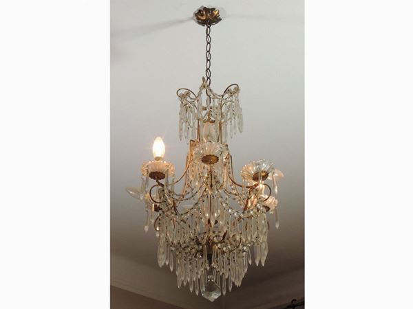 A small metal and glass basket chandelier