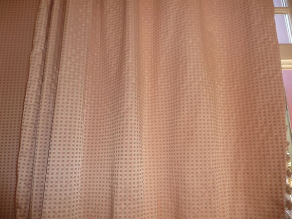 A bedroom pink fabric tapestry