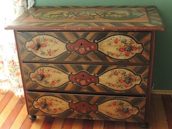 A Tyrolean painted wood chest of drawers