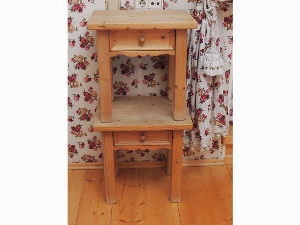 A pair of softwood small tables