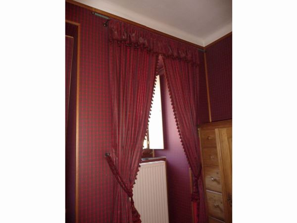 A pair of tartan cotton fabric curtains