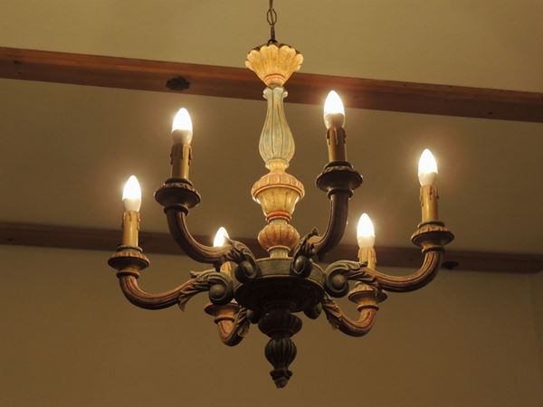 A pair of lacquered wooden chandelier