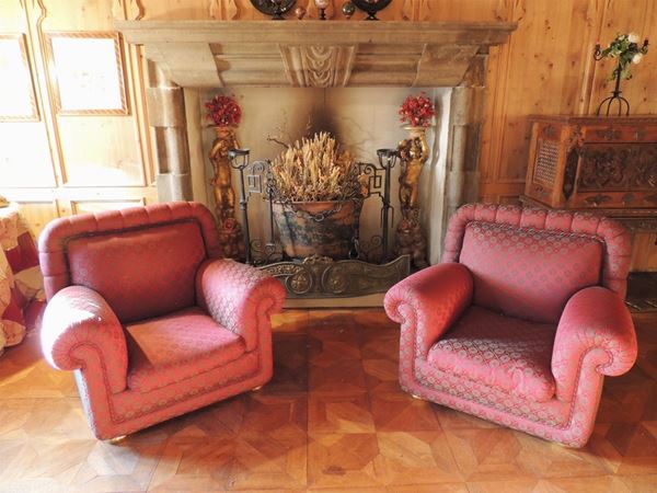 A pair of damask fabric upholstered armchairs
