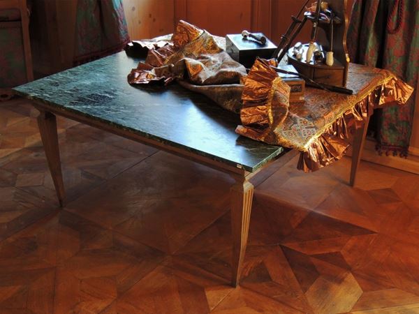 A walnut and green marble coffee table