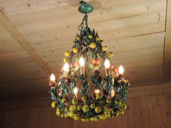 A lacquered wrougth iron chandelier