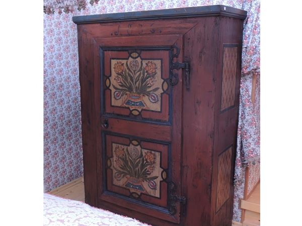 A small Tyrolean painted wooden wardrobe