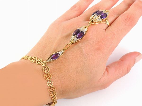 Yellow gold "hand-kissing" ring and bracelet with diamonds and amethyst quartzes