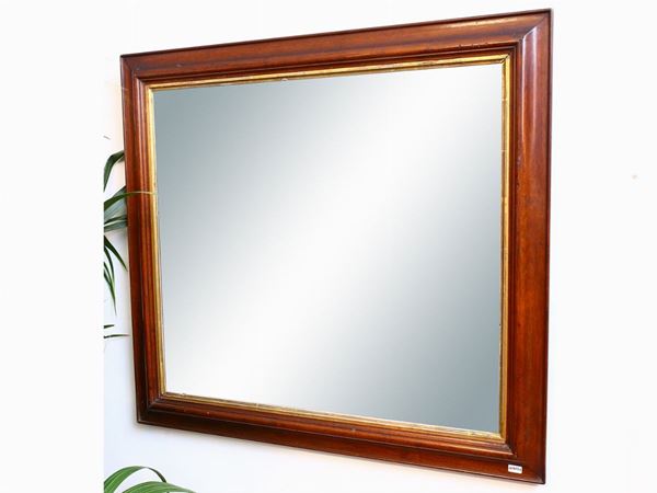 A walnut framed mirror