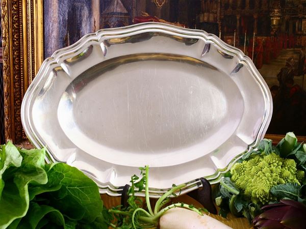 An oval silver tray