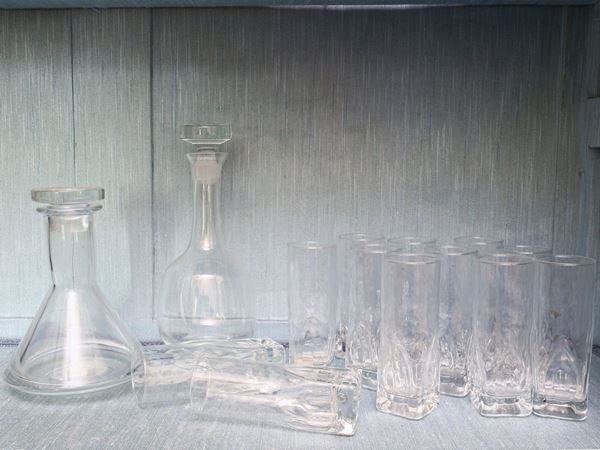 A set of twelve long-drink glasses and two bottles