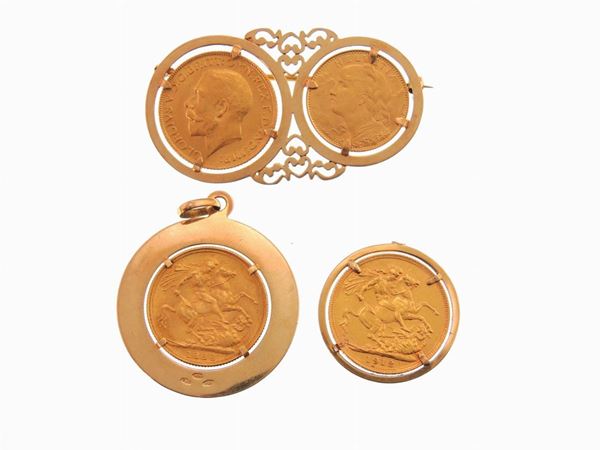 Quattro monete di vari stati con montature in oro