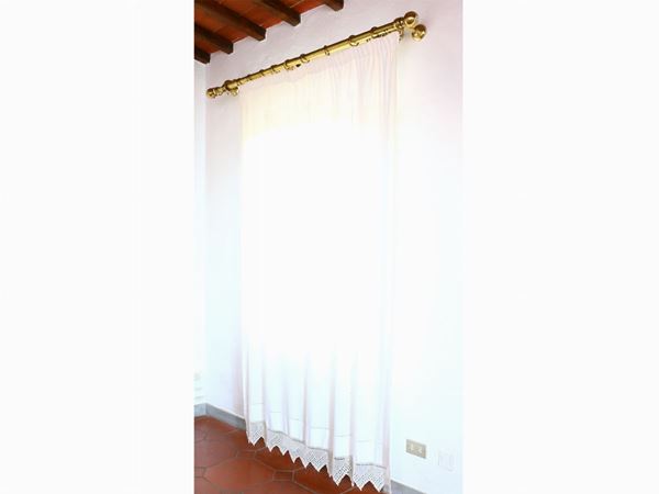 A pairs of embroidered curtains