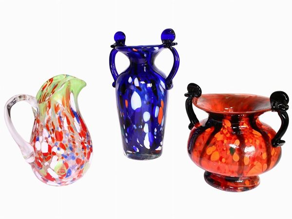Two glass vases and a pitcher