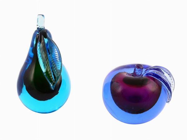 Two submerged glass fruits