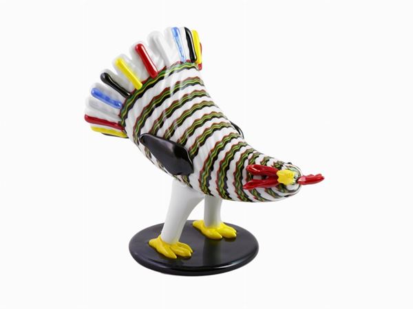 A rooster in polychrome glass and lattimo on a black base