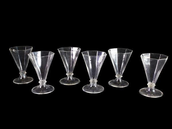 Six octagonal glasses with an applied lattimo rim