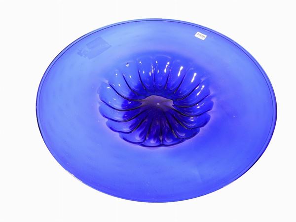 A large blue glass plate