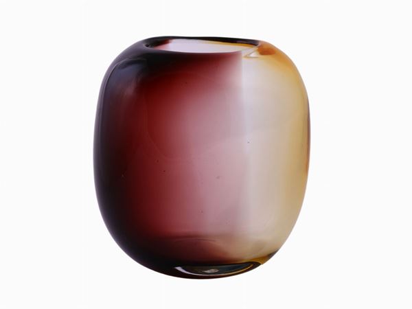 An amethyst and amber glass vase