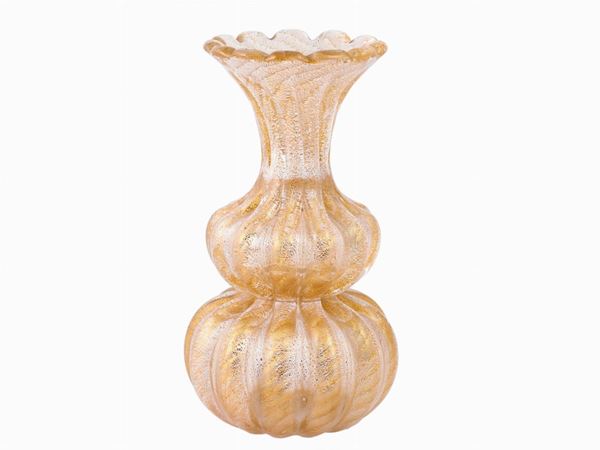 A costolato glass vase with gold leaf inclusions
