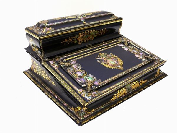 A black lacquered travel wrtiting desk mother of pearl veneered