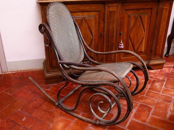 A curved beech rocking armachair  (early 20th century)  - Auction Furniture and Paintings from Palazzo al Bosco and from other private property - Maison Bibelot - Casa d'Aste Firenze - Milano