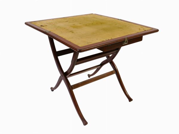 A mahogany folding table