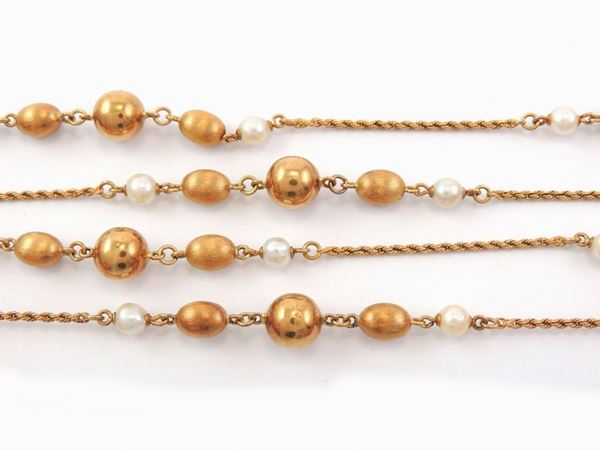 Collana satoire in oro giallo con perle coltivate