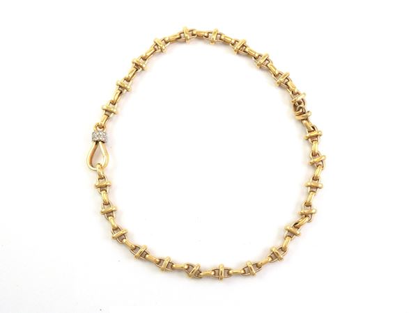 Yellow gold Pomellato necklace with diamonds